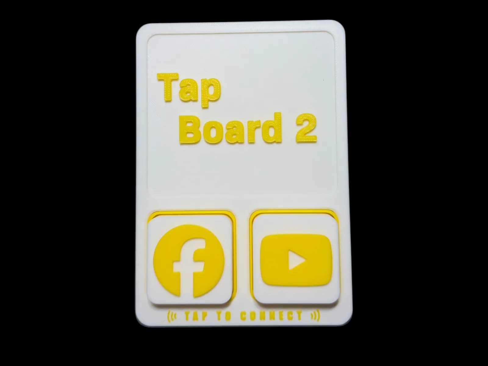 Tap Board 2 with two tiles in place: Facebook and YouTube.